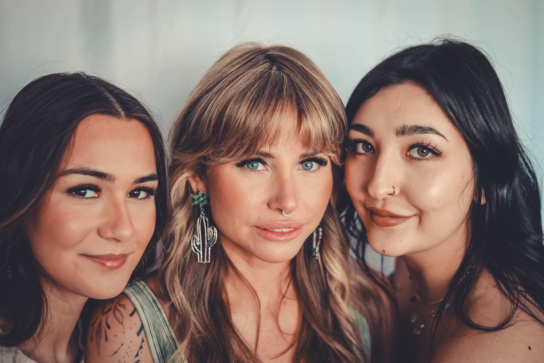 Three Plush Beauty Bar artists